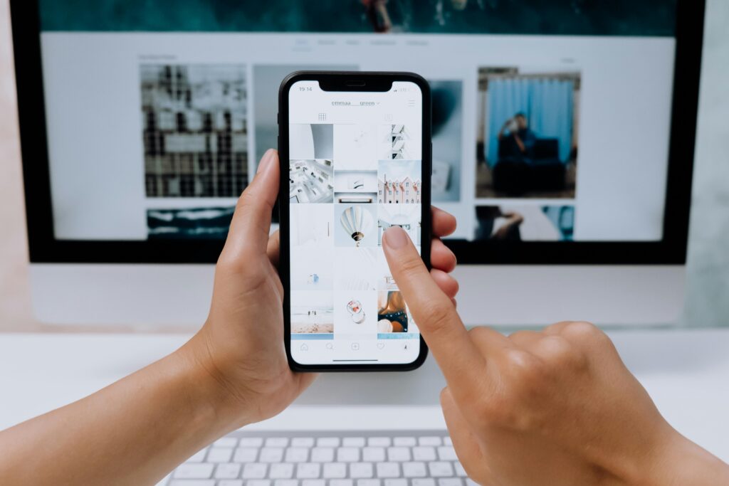 Person selecting images for social media use - Assets For Life