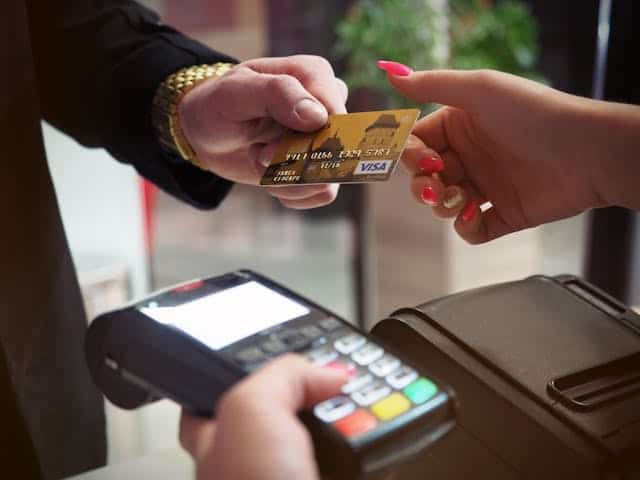 Person making a card payment - Assets For Life