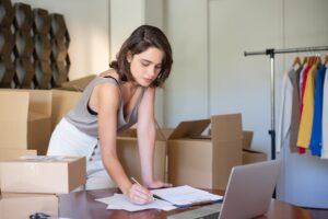 Woman checking a landlord inventory checklist - Assets For Life