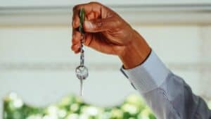 Landlord holding property keys - Assets for Life